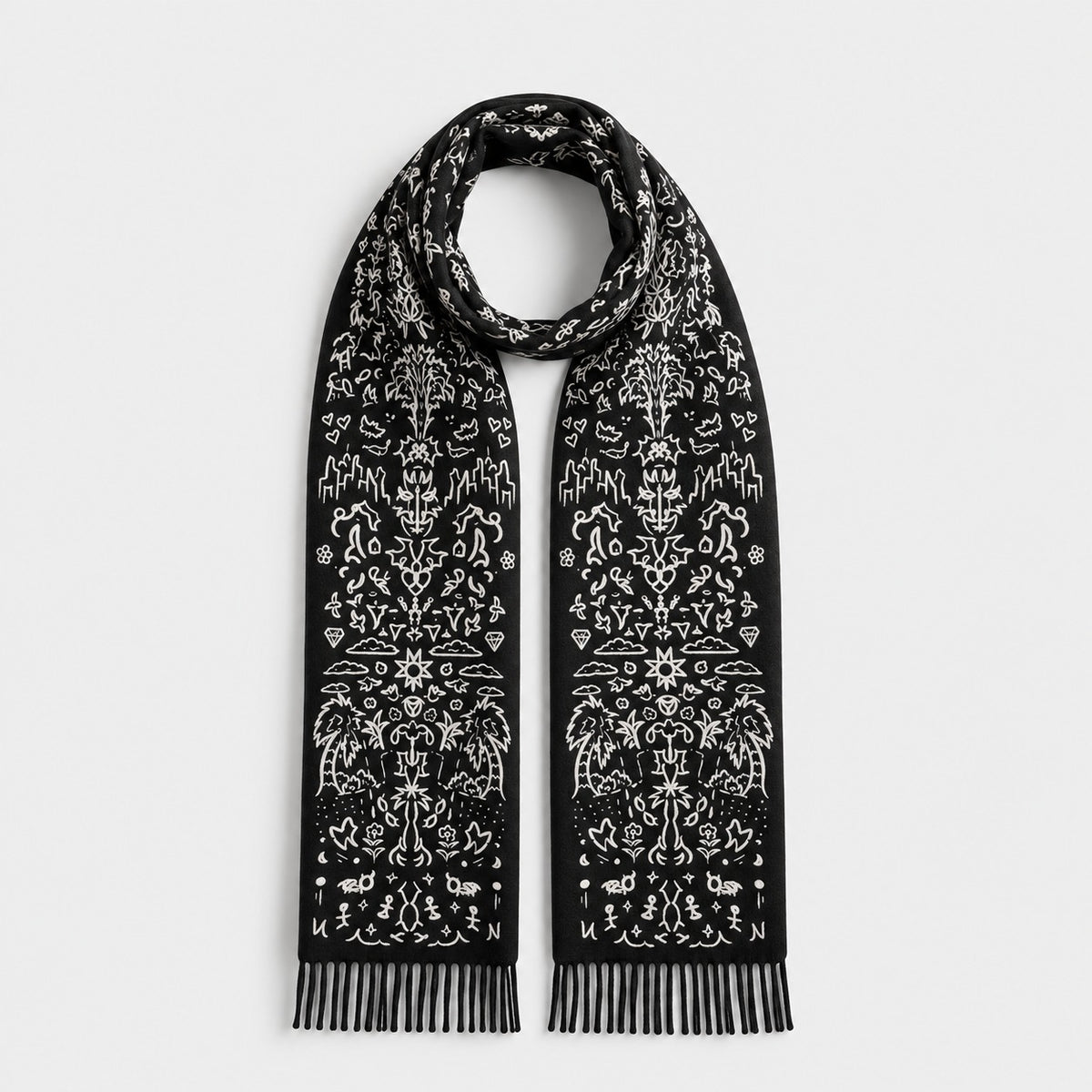 WORLDWIDE SCARF looped and laid flat, showing the mirrored hand-drawn pattern on both ends