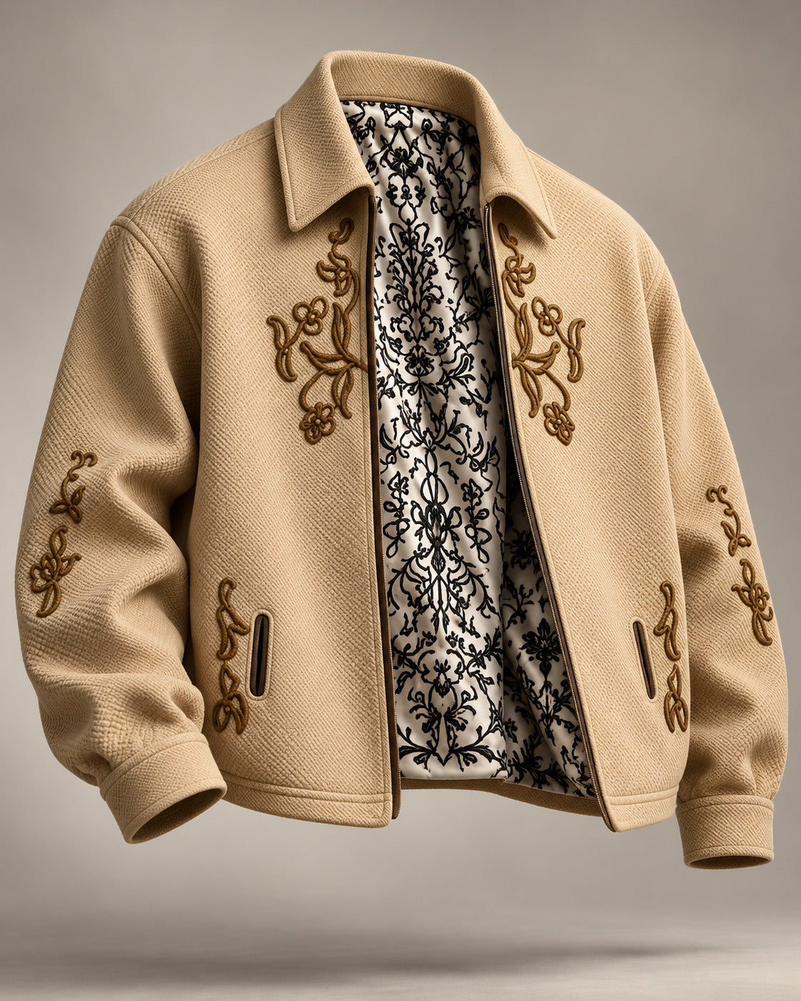 SUKOON JACKET front: cream honeycomb jacket with raised brown floral embroidery, open to a black and white damask lining